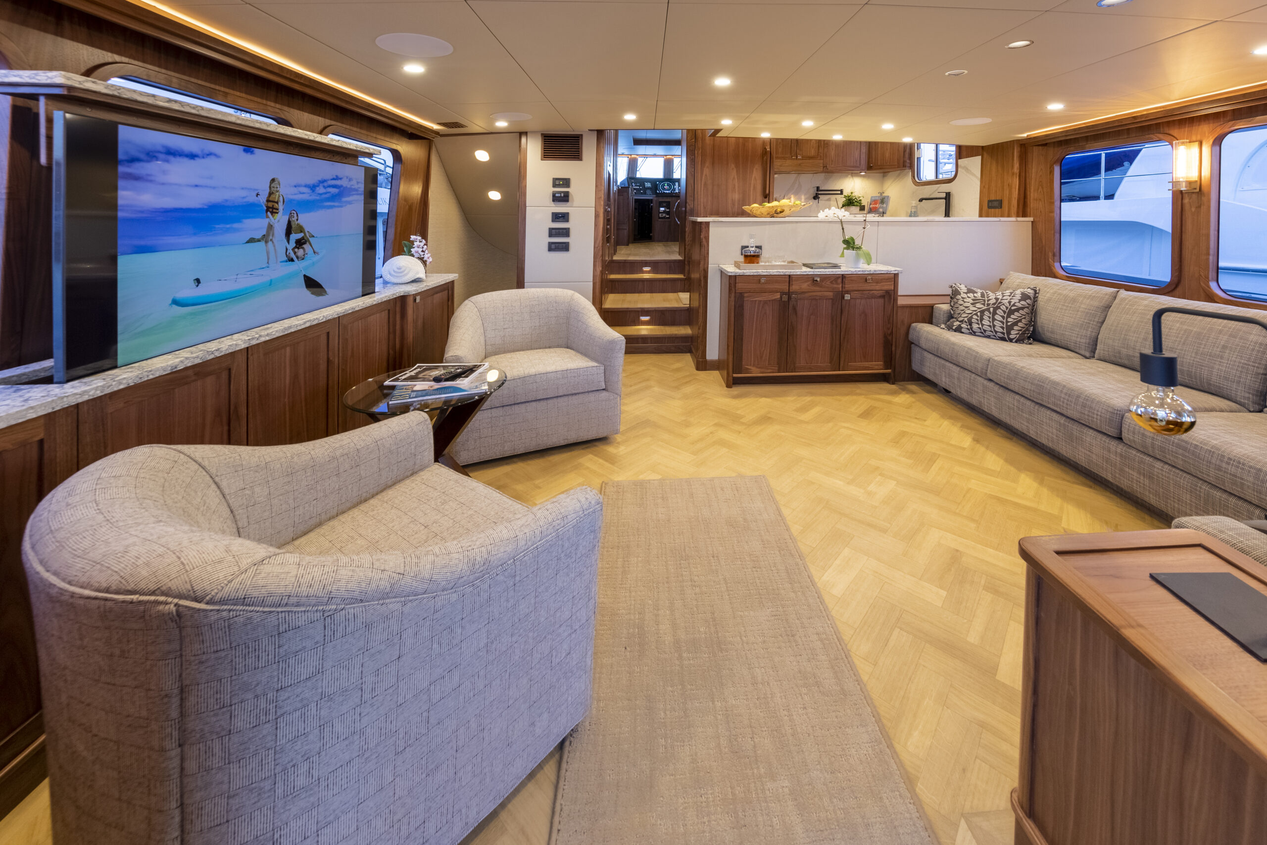 Northern Marine salon with warm wood finishes and comfortable seating